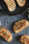 Pumpkin Ricotta Grilled Toasts with Chorizo, Sage, and Toasted Pepitas